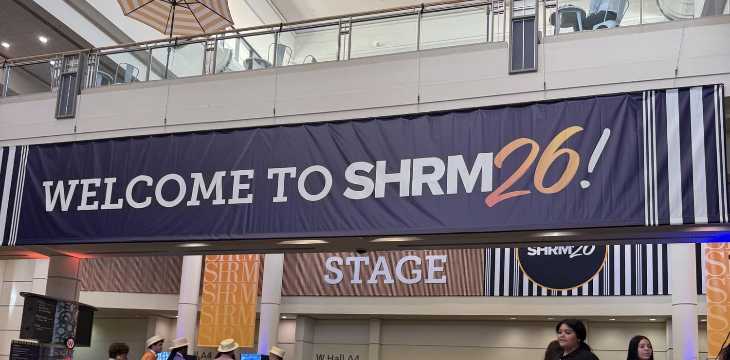 The Welcome to SHRM26 banner over the conference hall in Orlando